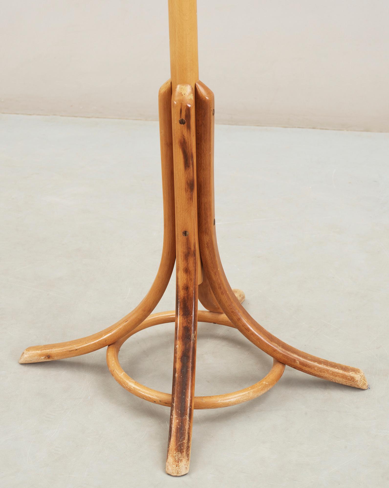 TAMBURMAJOR / KLÄDHÄNGARE, 1900-tal.