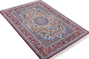 An Isfahan rug, a. 243 x 158 cm.