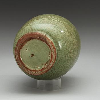 A celadon glazed jar, Ming dynasty (1368-1644).