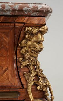 A French Régence 18th century commode in the manner of F. Mondon.