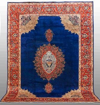 A carpet, Figural Kashmar, ca 380 x 284 cm.