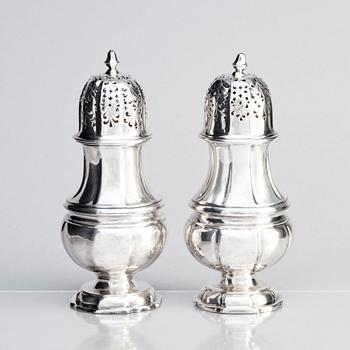 A pair of Swedish silver sugar shakers, mark of Conrad Gadd, Kristianstad 1744 and Johan Bergengren, Kristianstad 1754.
