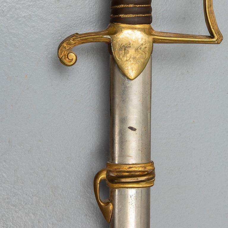 A Swedish late 19th century small sward, and a belt by Sporrong, 20th century.