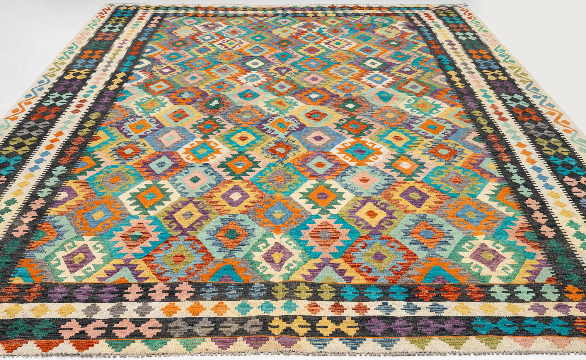 An, Afghan kilim carpet, c. 496 x 319 cm.