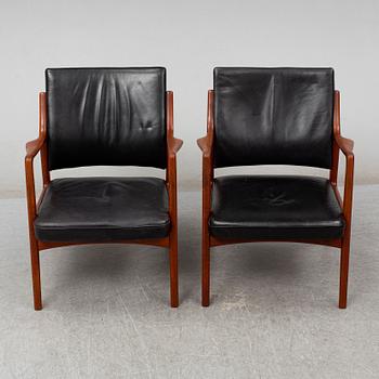 KARL ERIK EKSELIUS, a pair of late 20th Century easy chairs.