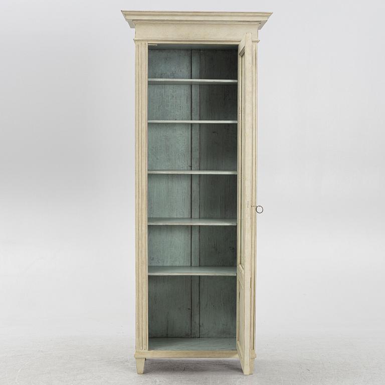A display cabinet, late 19th Century.