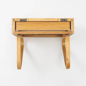 Alvar Aalto, a console/shelf, Aalto Möbler Hedemora, Sweden, mid 20th Century.