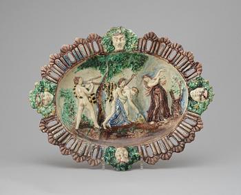 133. A majolica charger in the style of Pallisy, 'Istoriato'.