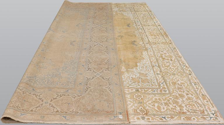 An oriental carpet ca 400 x 295 cm.