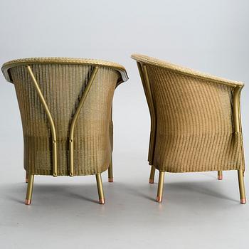 A PAIR OF ARM CHAIRS, Lloyd Loom, Spalding, England, turn of the 21st century.