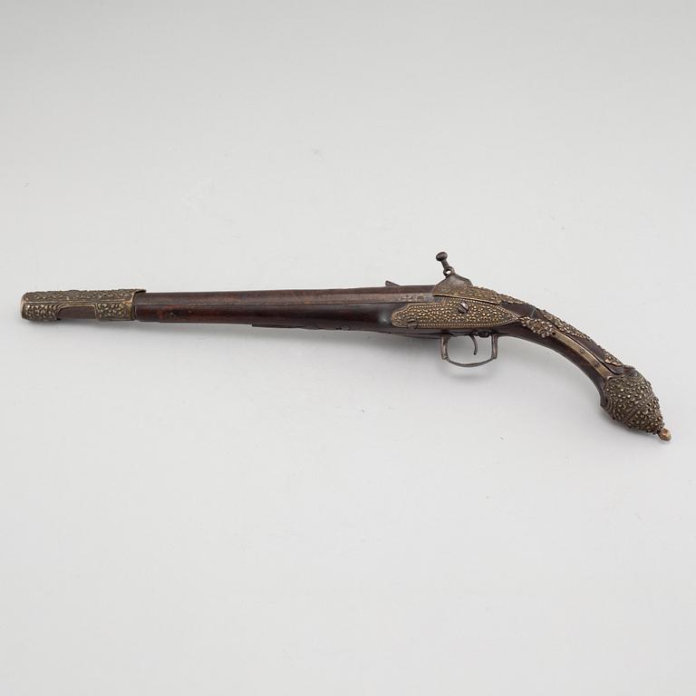 A mid 19th century miquelet lock pistol.