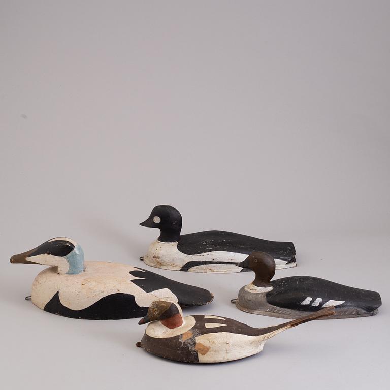 4 painted wooden ducks from the 20th century.