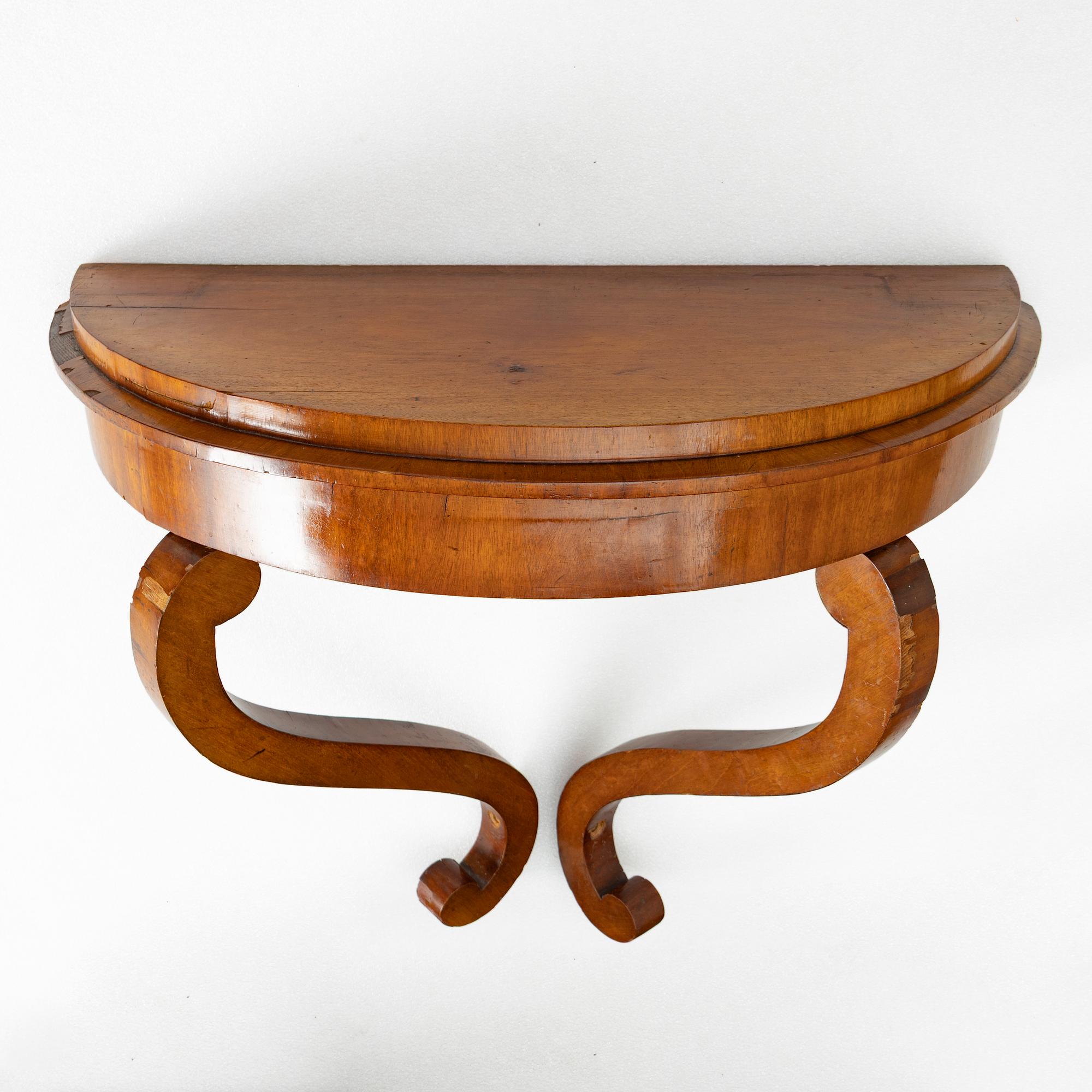 A Late Empire style mirror with a console table, second half of the 19th century.