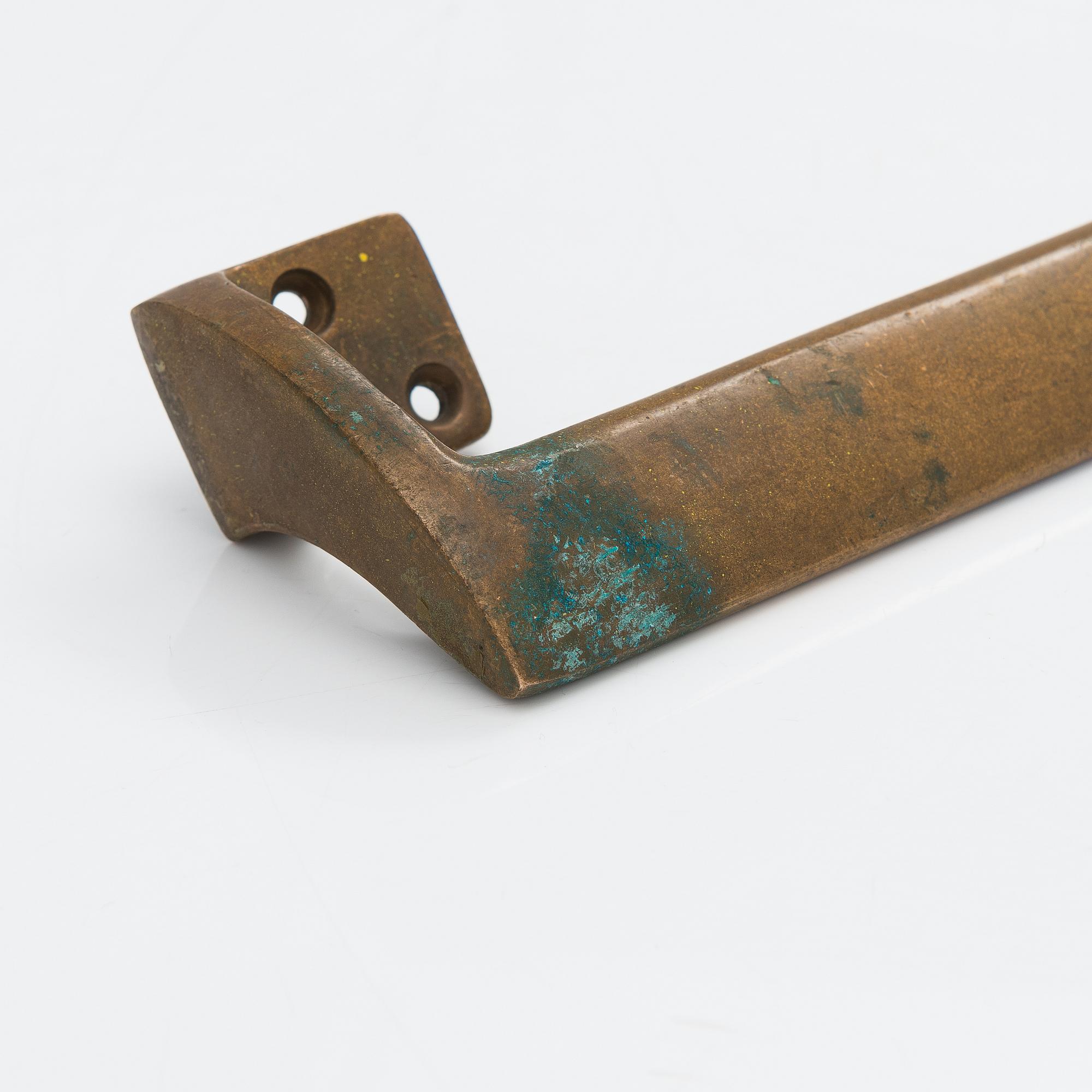 Door handles, three pieces, ca 1900 and 1960s.