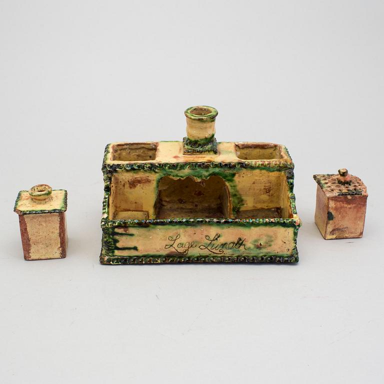 A 19th century pottery ink stand.