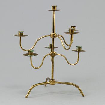 A brass kandelabra model 2454 by Josef  Frank for Firma Svenskt Tenn.
