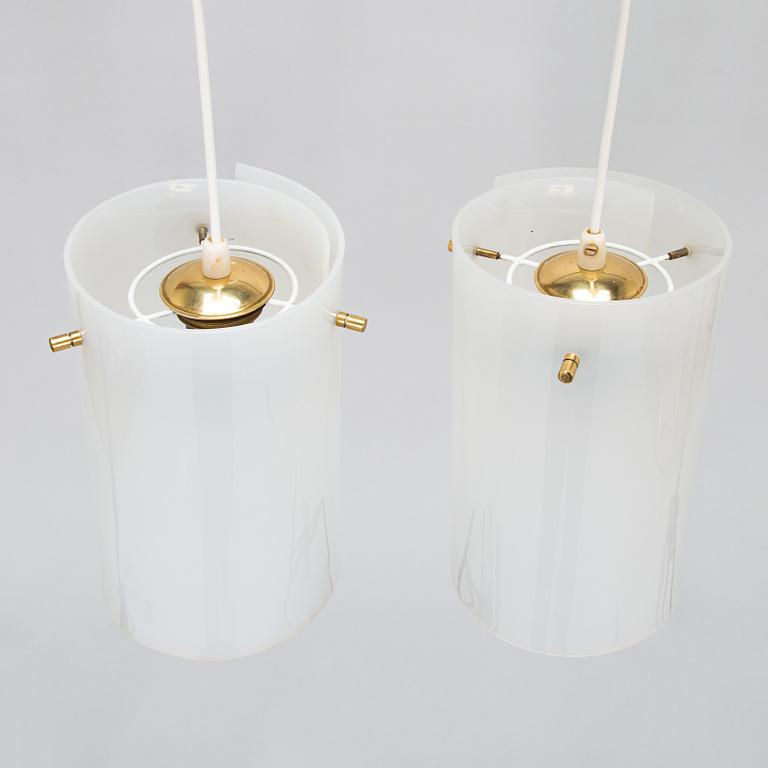 A pair of mid-20th century pendant lights for SO, Pohjoismainen Sähkö Oy, Finland.