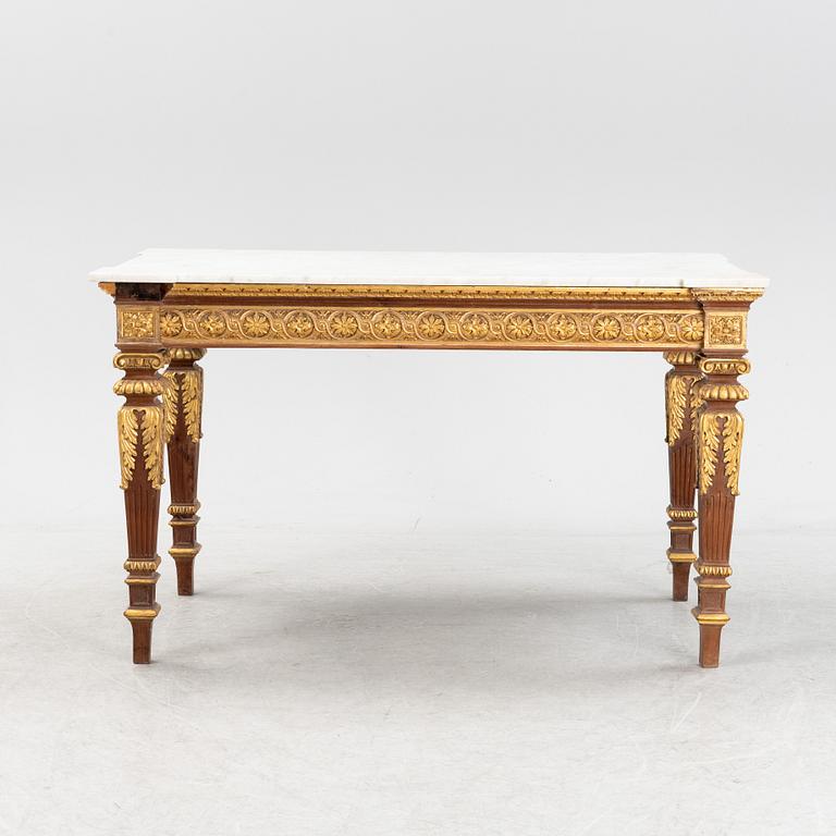 A Louis XVI-style table, France, 19th Century.