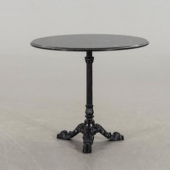 A MODERN CAST IRON GARDEN TABLE.