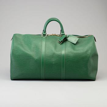 A "Keepall 55 Epi" weekendbag by Louis Vuitton.