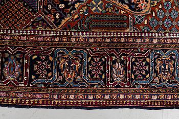 A rug, semi-antique Kashan, ca 216,5 x 140 cm.