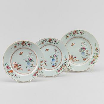 A famille rose dish and two dinner plates, Qing dynasty, Qianlong (1736-95).