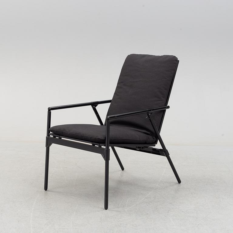 A 'Nena' folding chair by Richard Sapper, B&B Italia.