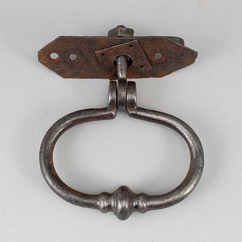 An 18th century cast iron door knocker.