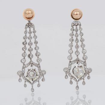 A pair of single-, brilliant-, and old-cut diamond earrings. Total carat weight circa 8.00 cts.