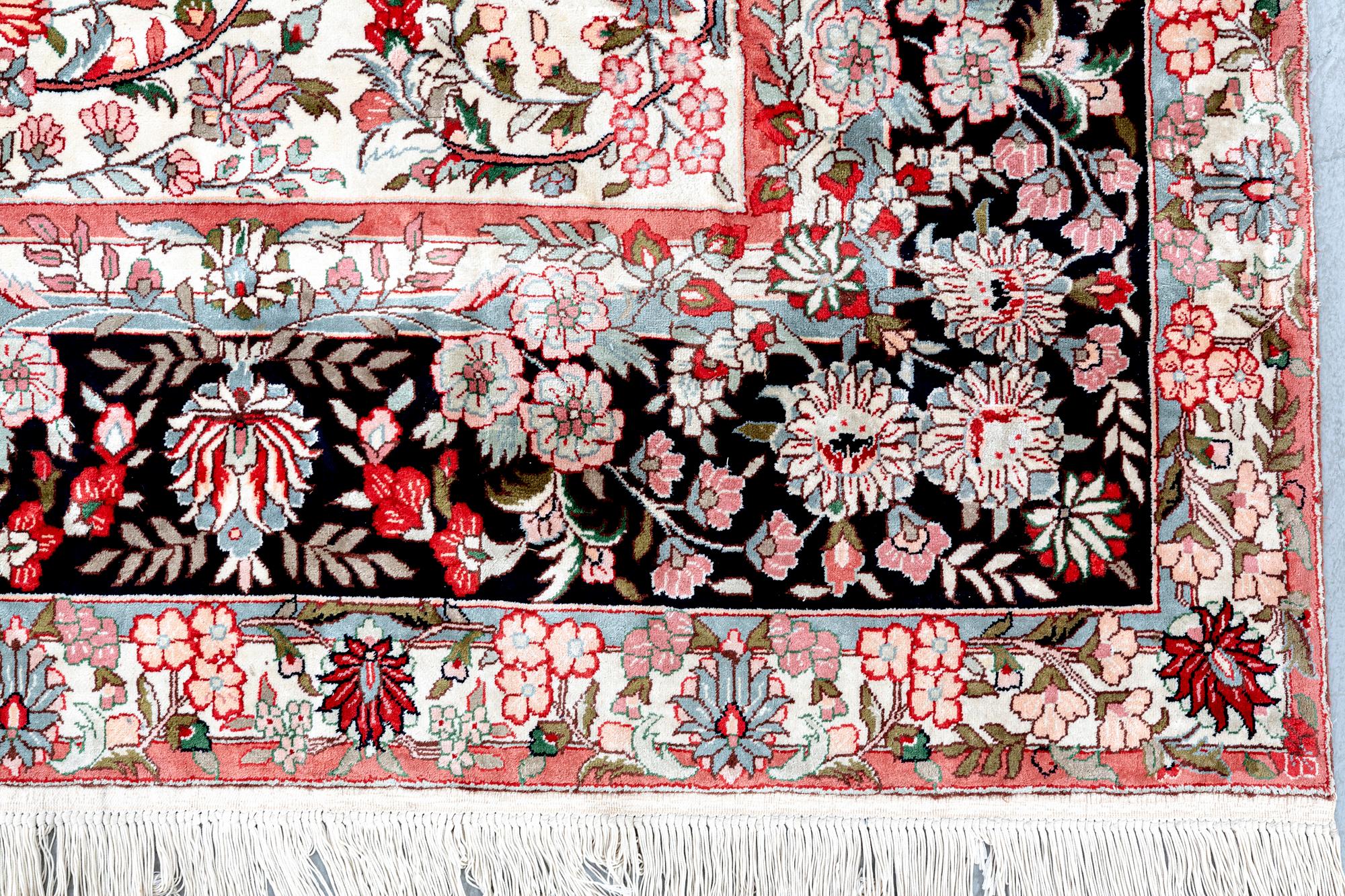 An old silk Taharan design carpet ca 296x244 cm.
