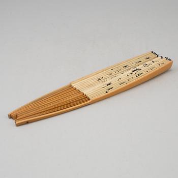 A fan leaf painting by Chen Donghu, signed and dated 1942.