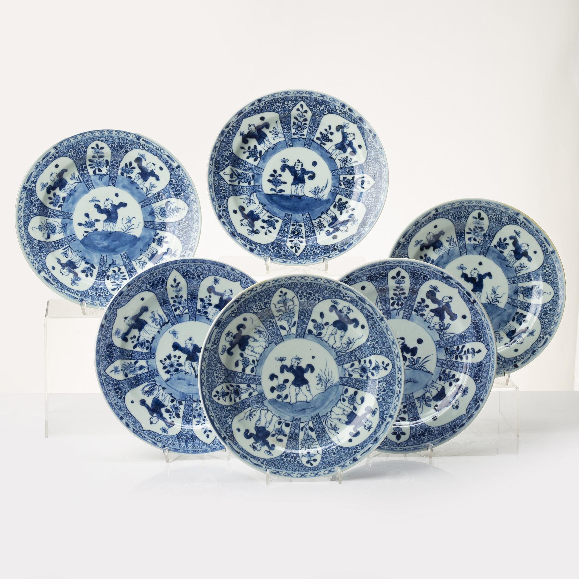 A set of six Chinese blue and white porcelain 'boys' plates, Qing dynasty, 18th century.