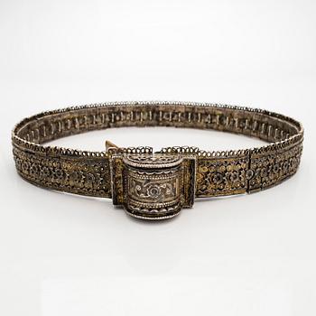 A Caucasian parcel-gilt costume belt with niello decor, 1908-26.