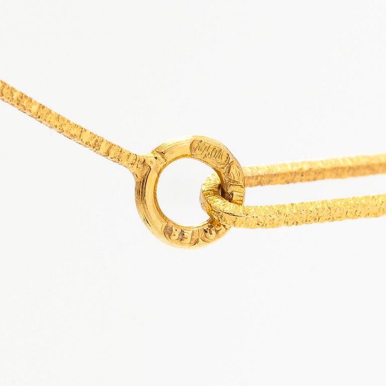 Björn Weckström, An 18K gold necklace "Diamondbud" with an eight-cut diamond ca 0.02 ct. Lapponia 1982.