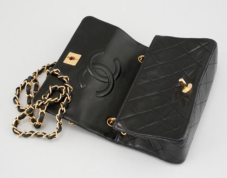 A 'Mini Flap' Chanel lamb skin handbag.