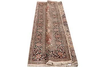 A carpet, silk Kashmir, c. 279 x 180 cm.