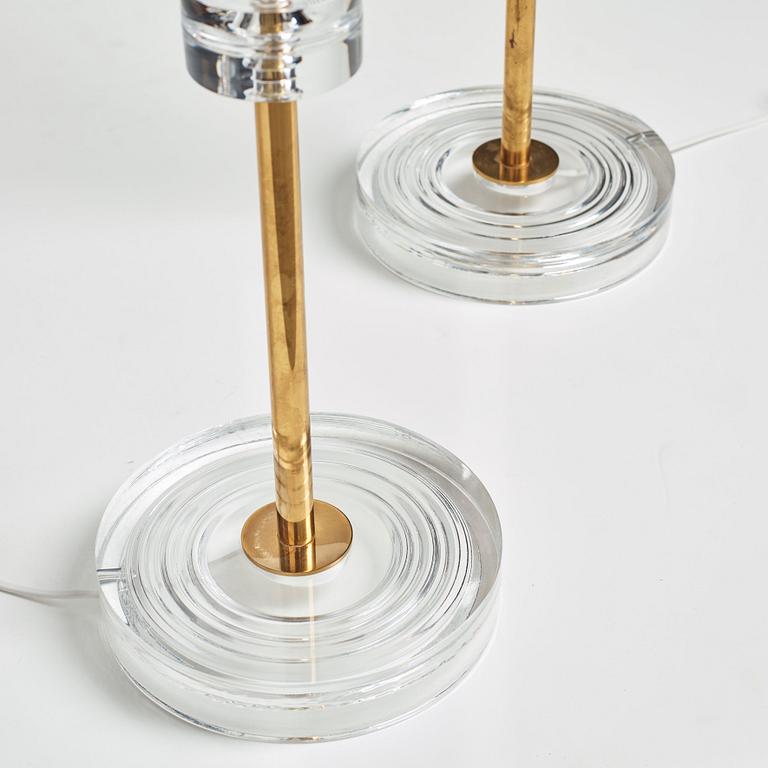 Carl Fagerlund, a pair of glass and brass floor lights, Orrefors,  Sweden 1960-70's, model RD1990.