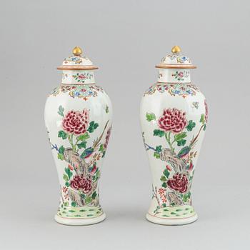 A pair of French Famille rose Samson vases with covers, end of 19th Century.