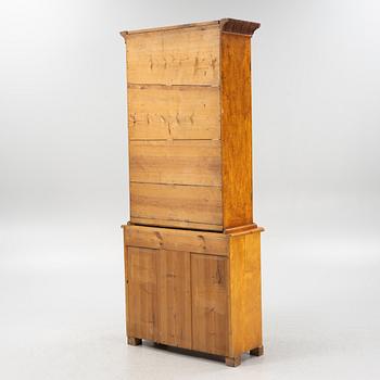 A birch wood veneered book cabinet early 20th Century.
