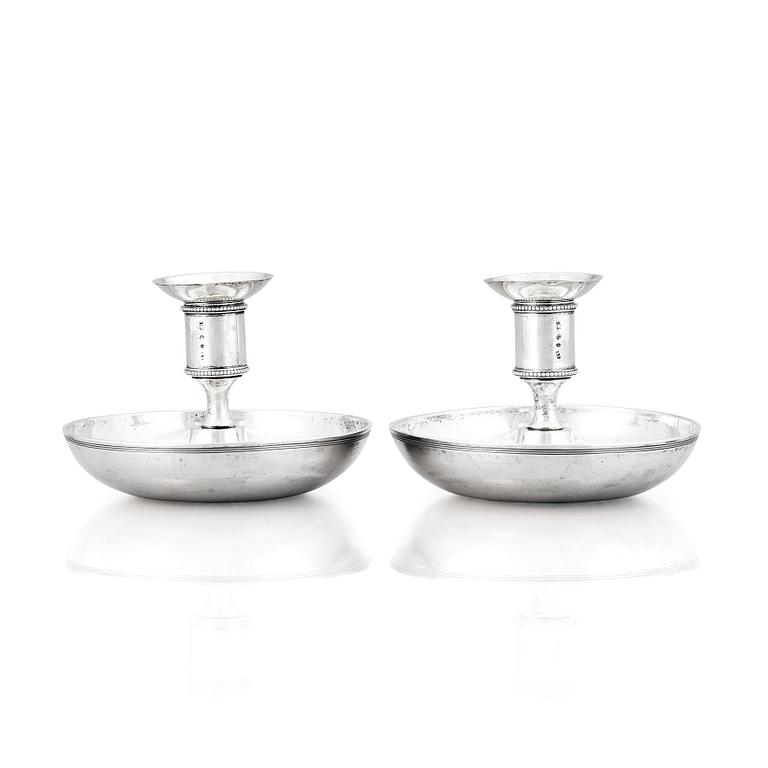 A pair of Swedish early 19th century silver chamber-candlesticks, mark of Adolf Zethelius, Stockholm 1816.