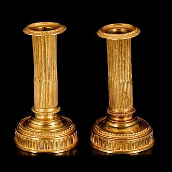 LJUSSTAKAR, ett par, mässing, empirestil, 1900-tal.