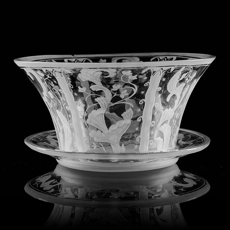 Simon Gate, a Swedish Grace engraved glass bowl with stand, Orrefors 1930, model 147, engraved by Karl Rössler.