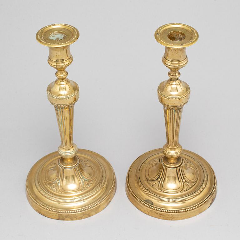 A pair of late 18th century candlesticks.