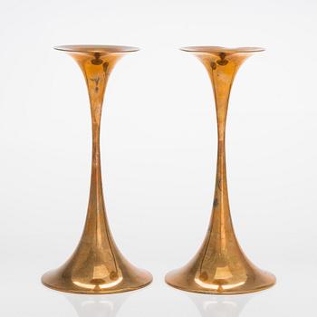 Tapio Wirkkala, A pair of bronze 'Trumpet' candlesticks, stamped Tapio Wirkkala, Hopeakeskus Oy Made in Finland.