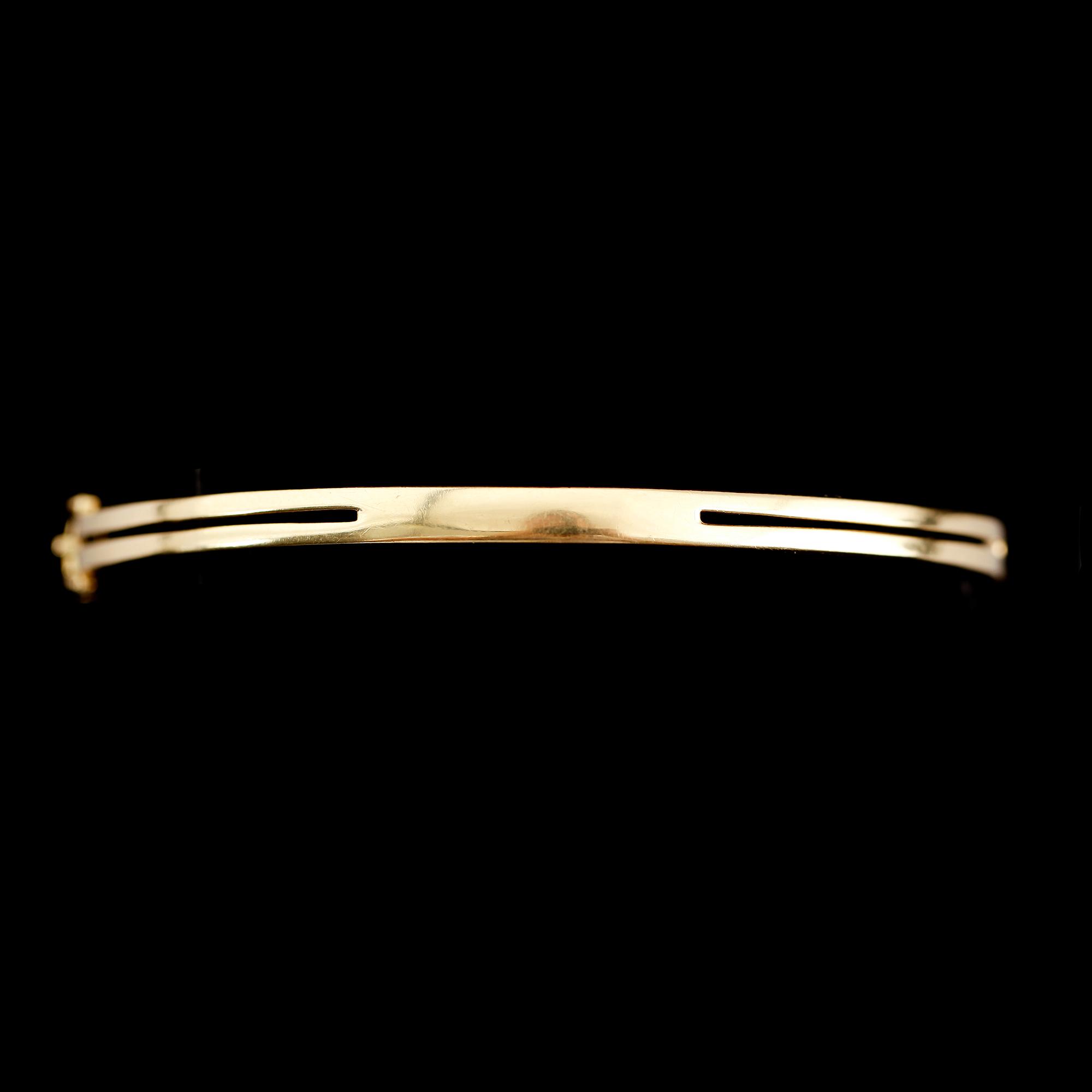 ARMBAND, 18 k guld med briljantslipade diamanter. Total vikt 10 g.