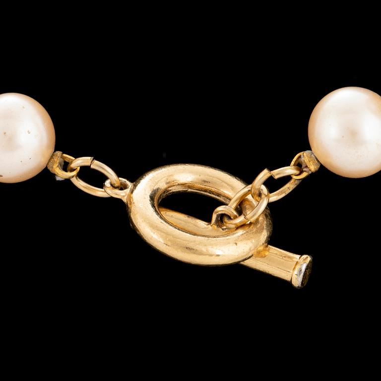 GIVENCHY, a faux pearl necklace.