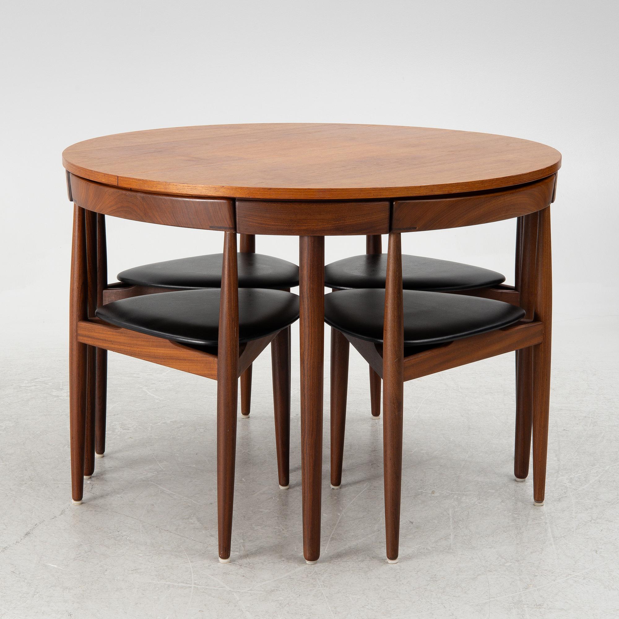 Hans Olsen, a dining table and four chairs, Frem Røjle, Denmark, 1950's.