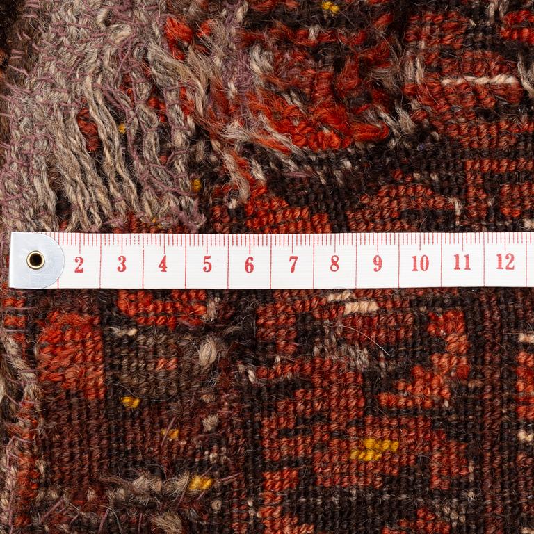 An antique Bechir rug, approx. 215 x 148 cm.