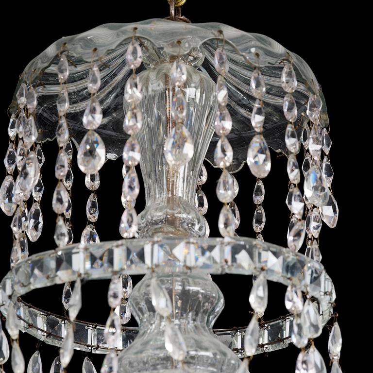 A Bohemian Louis XVI moulded and cut-glass six-branch chandelier, late 18th century.