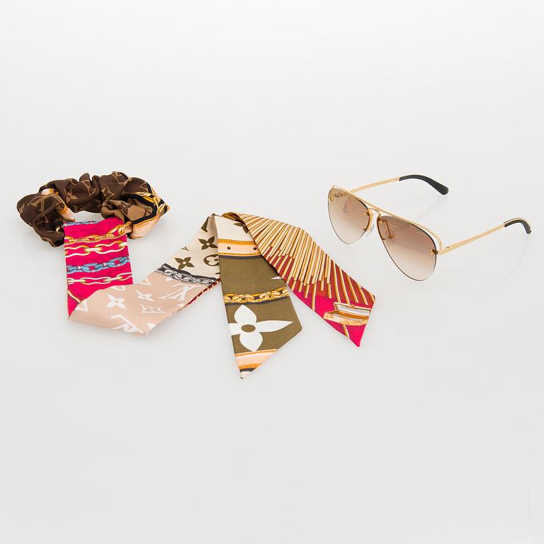 Louis Vuitton, 'Grease' sunglasses and a Chouchou scrunchie.